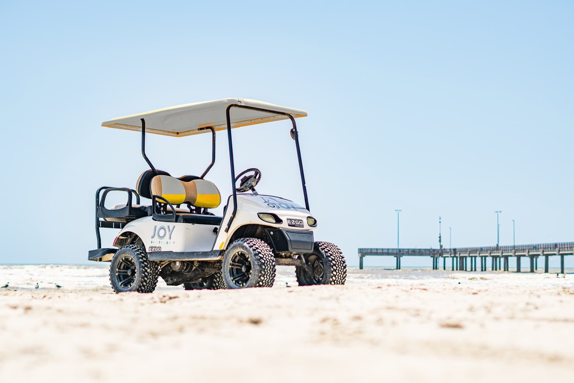 4-passenger golf cart rental compared with larger Port Aransas carts