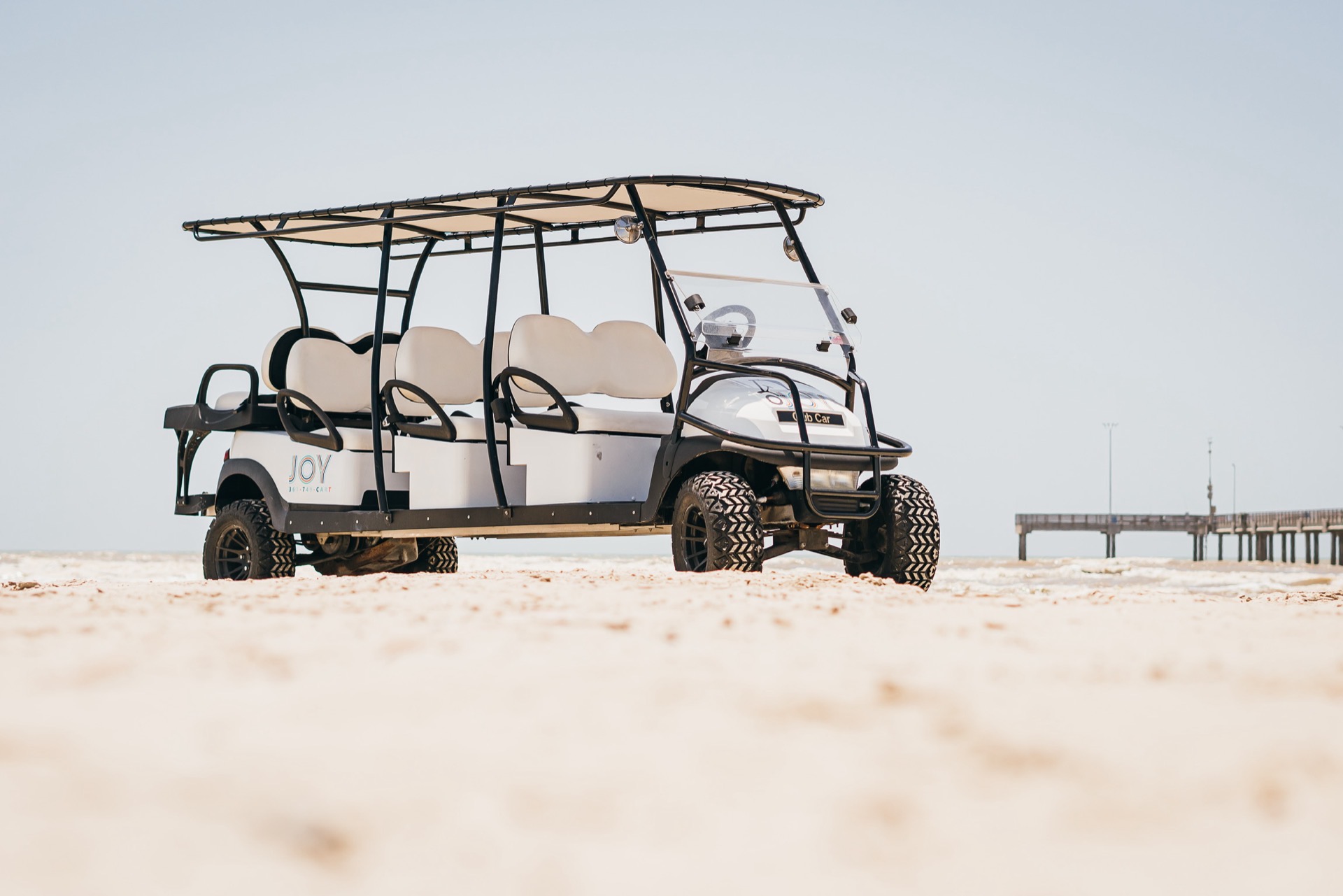 Stretch cart at the beach for scale